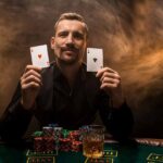 Man is playing poker with a cigar and a whiskey, a man show two